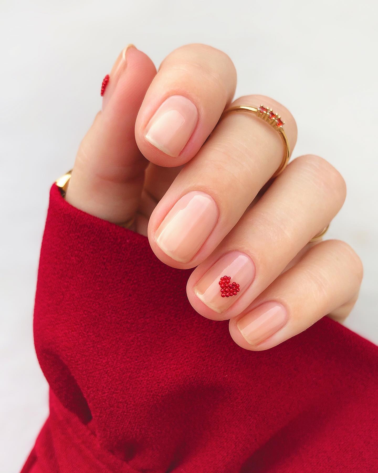 22. Delicate Affection: Tiny Hearts with a Pop Of Elegance