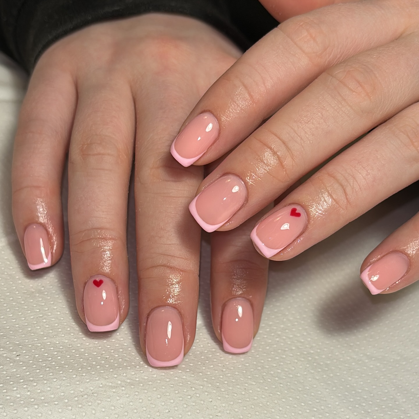 46. Sweetheart Elegance: a Flirty Twist on Classic French Tips