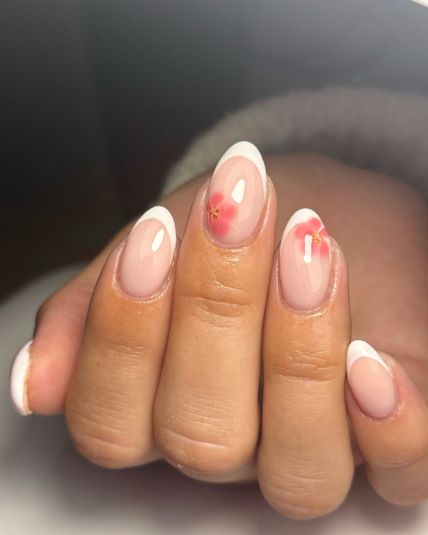 14. Floral Whispers: a French Tip Transformation