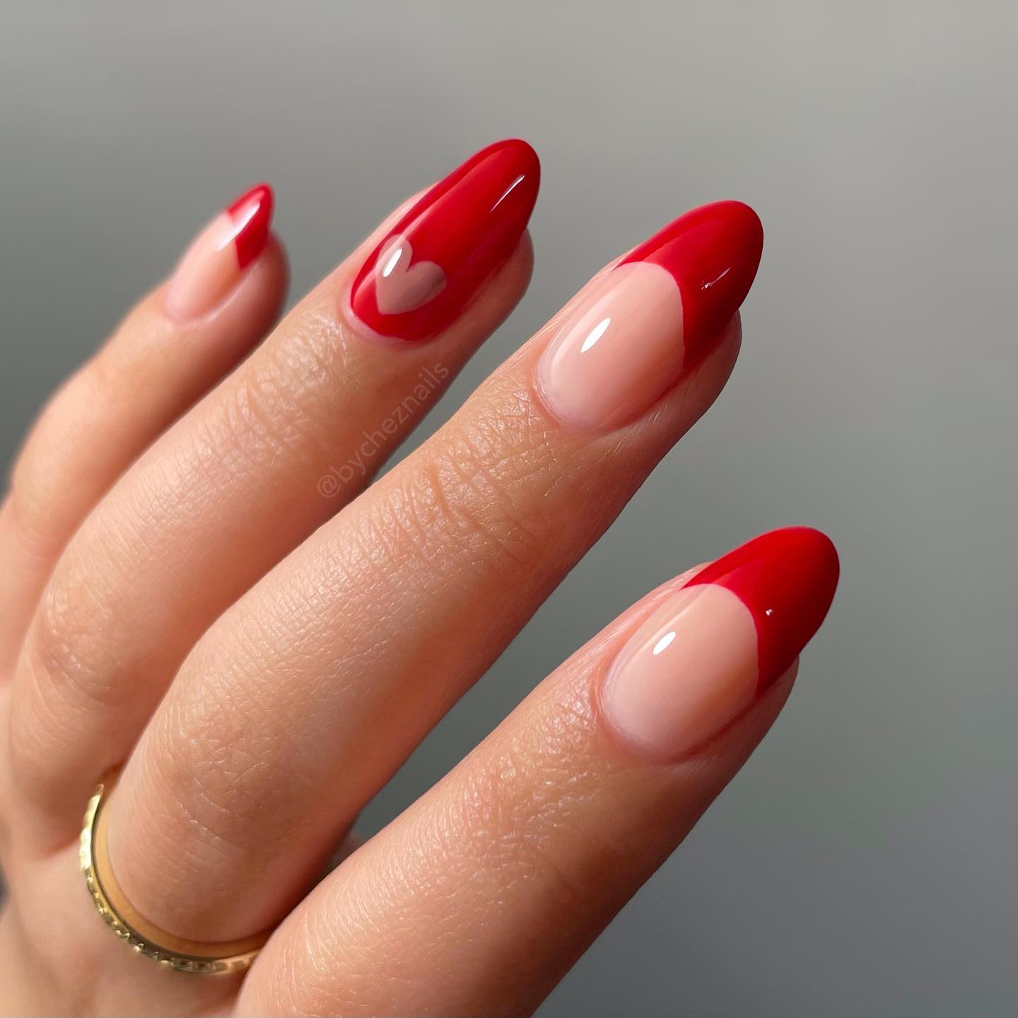 15. Lustrous Love: Romantic Ombre Tips with Heartful Charm