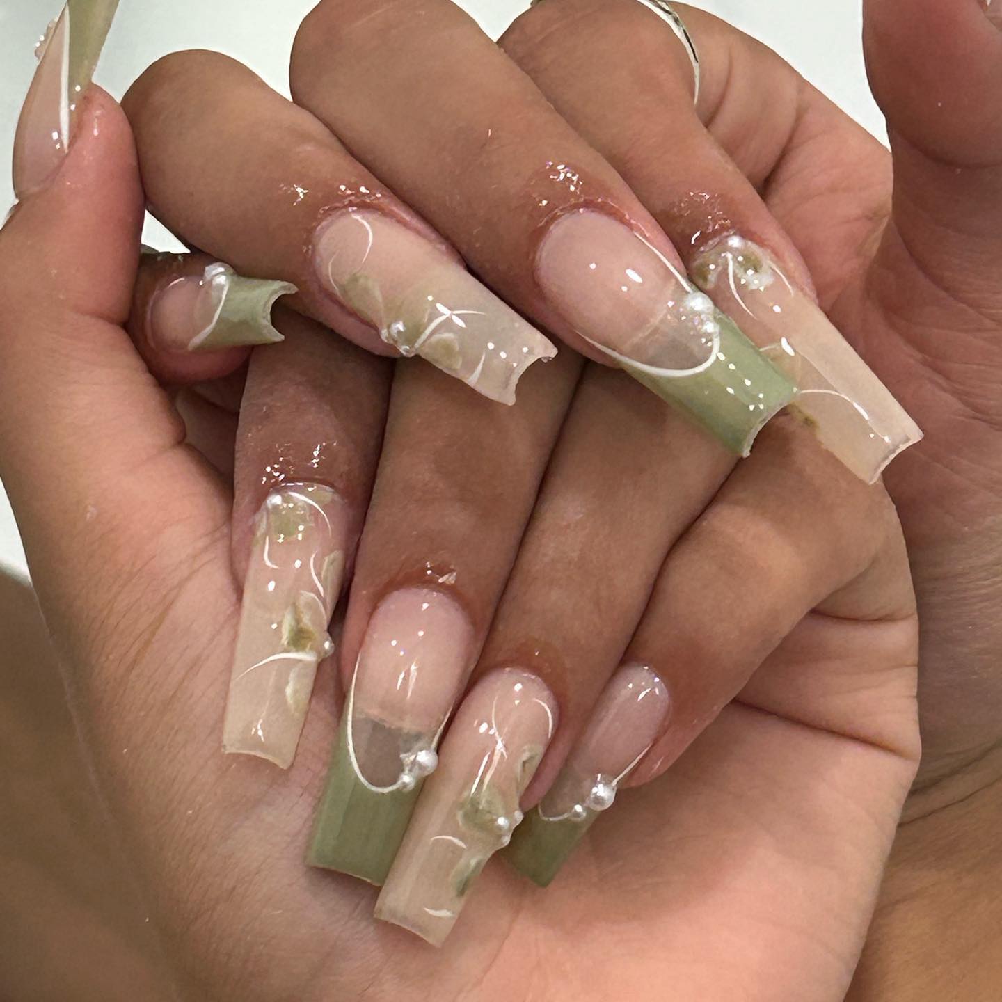 6. Whimsical Elegance: Sage-infused Nail Art with a Touch Of Pearls