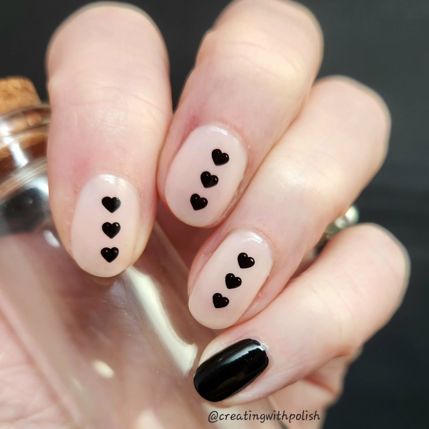 31. Black Hearts on a Neutral Canvas