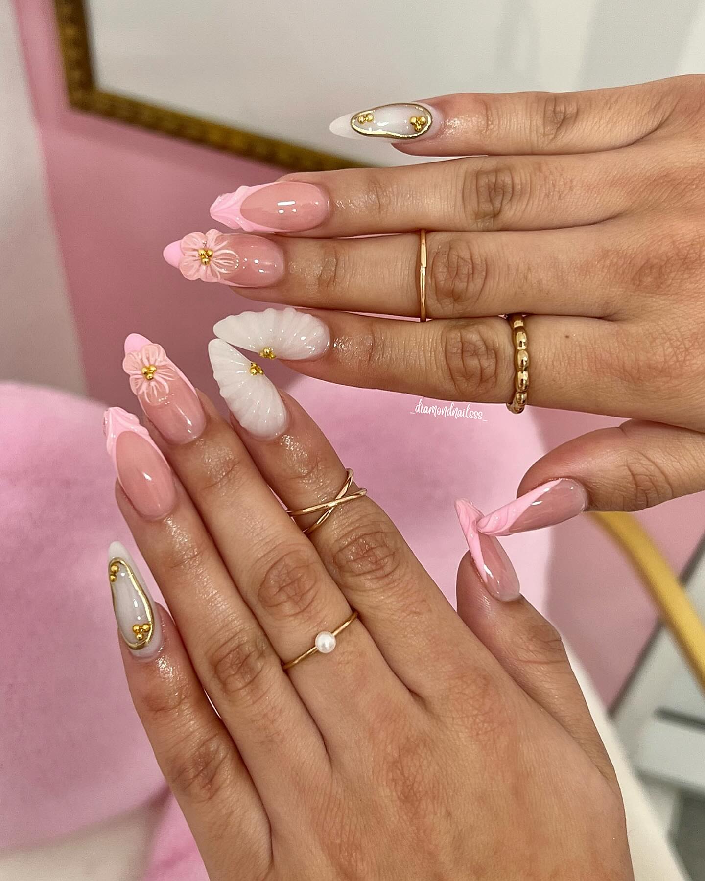 2. Blossoms and Gold: a Romantic Twist on Classic French Tips