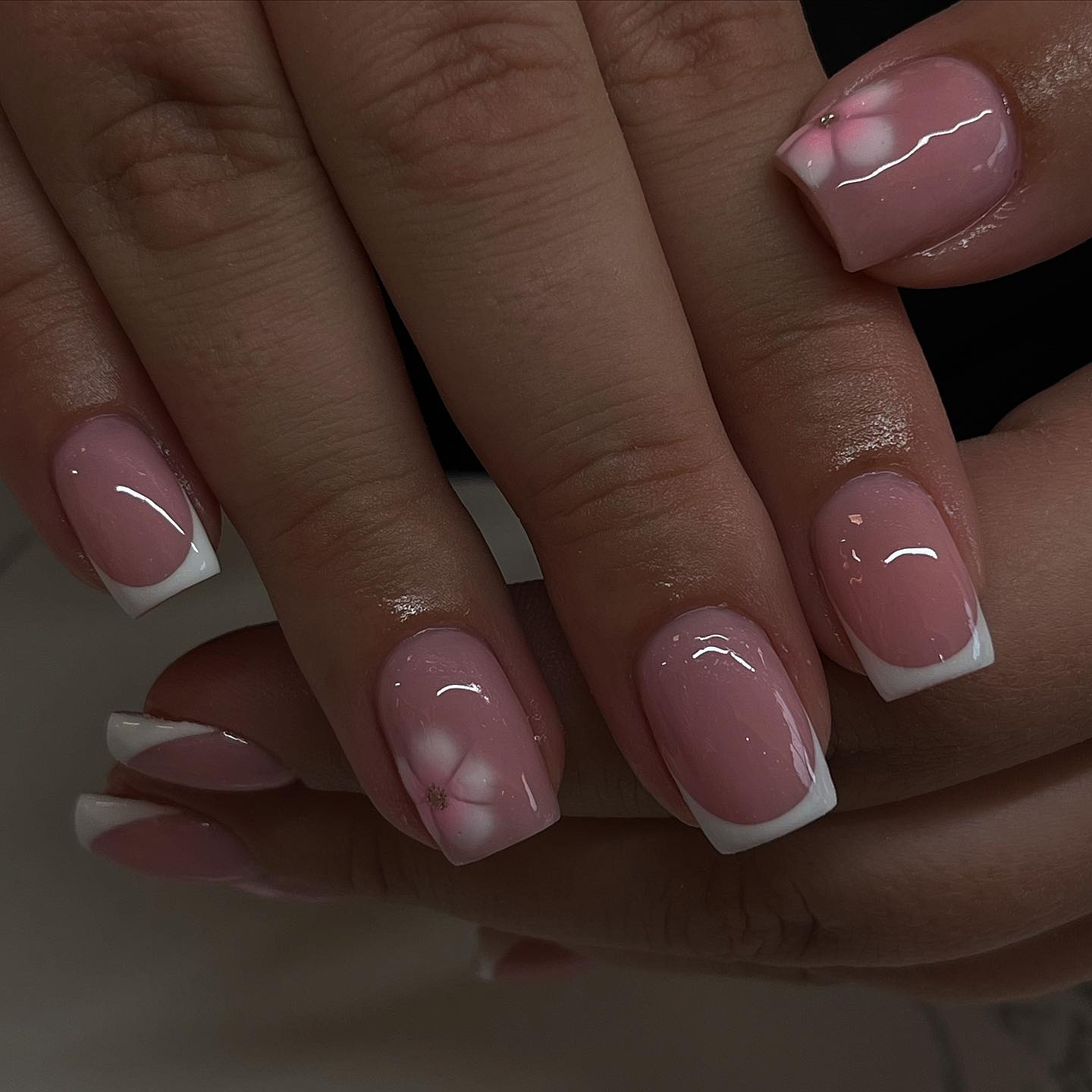 29. Blossom-infused Elegance: a Fresh Take on French Tips
