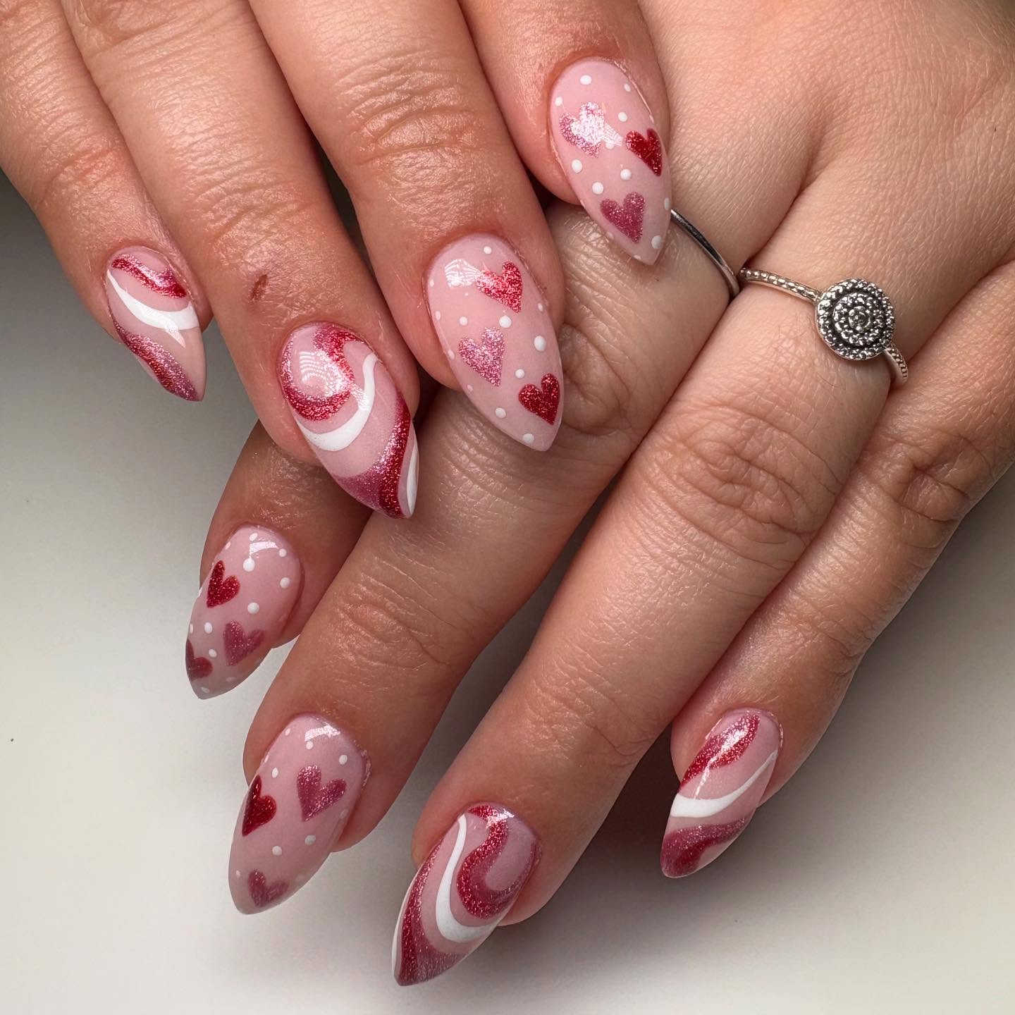 1. Whimsical Romance: Twirl Of Love on Sleek Almond Tips