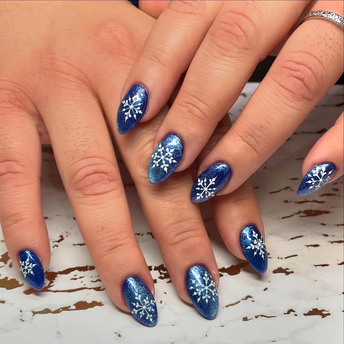 22. Frosted Elegance: Celestial Snowflakes on Midnight Blue