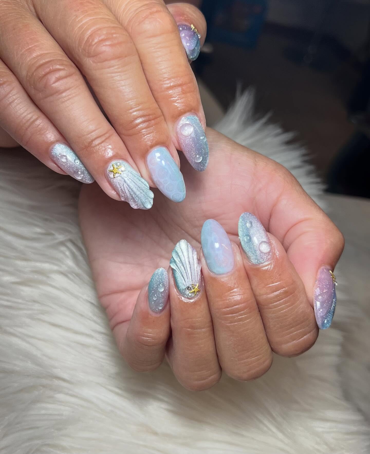 26. Ethereal Oceanic Whispers: a Masterpiece Of Summer Nail Art