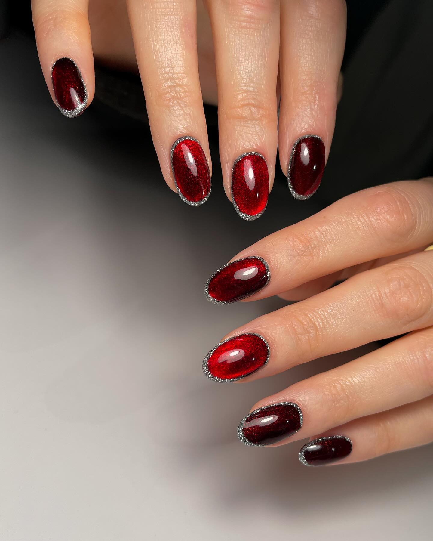 6. Glistening Garnet Elegance with a Silver Twist