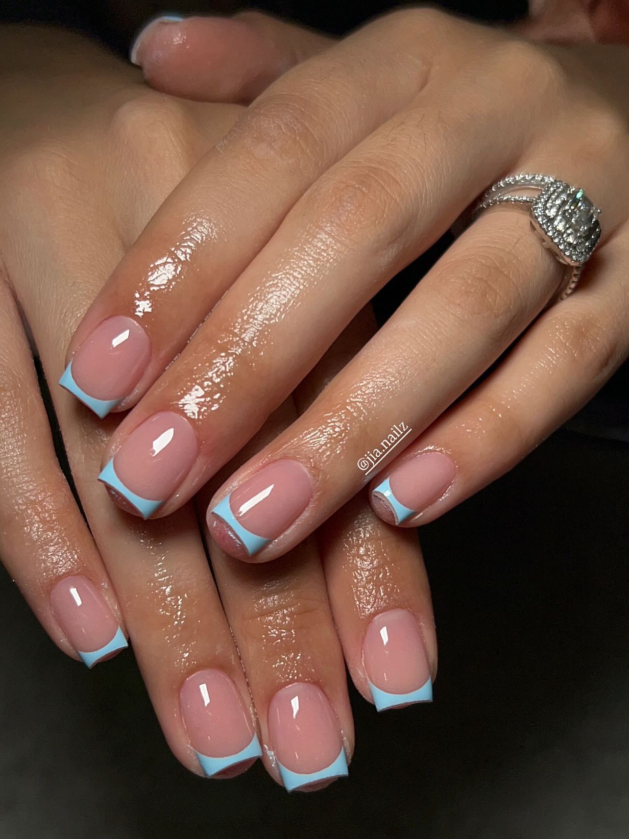 23. Aqua-cut French Tips: a Chic Twist on Classic Elegance