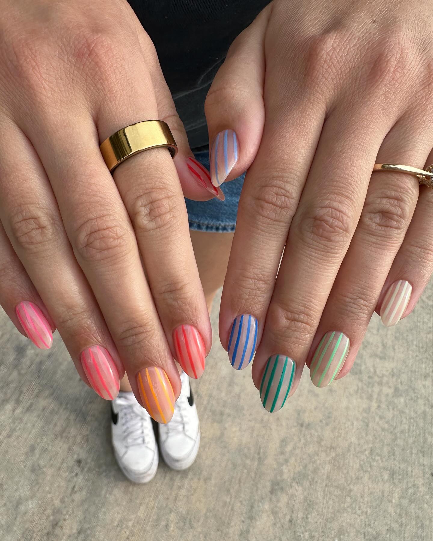 53. Colorful Candy Stripe Delight: a Playful Twist on Nail Art