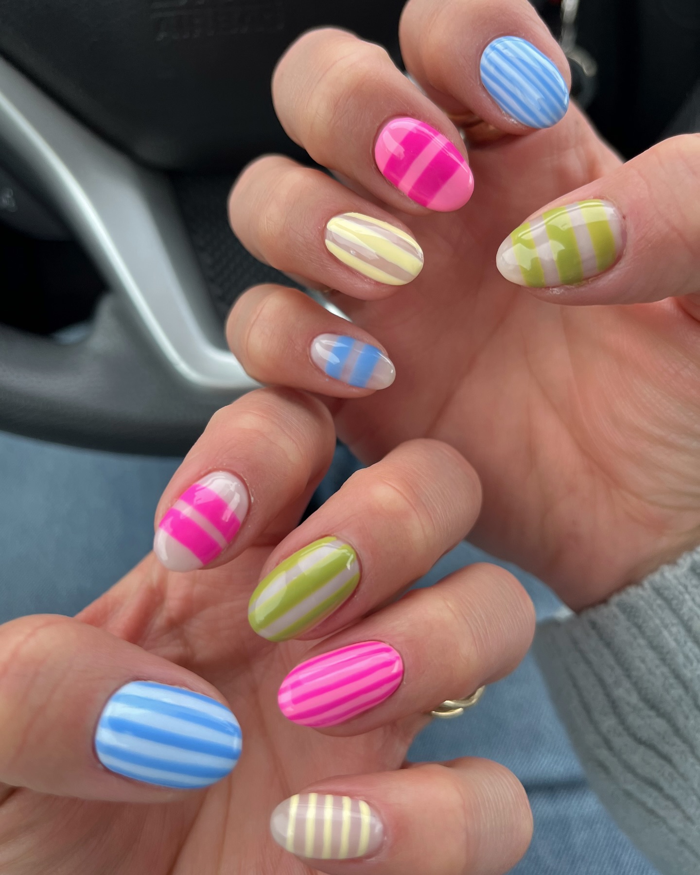 50. Stripes and Sunshine: a Colorful Twist on Spring Nails