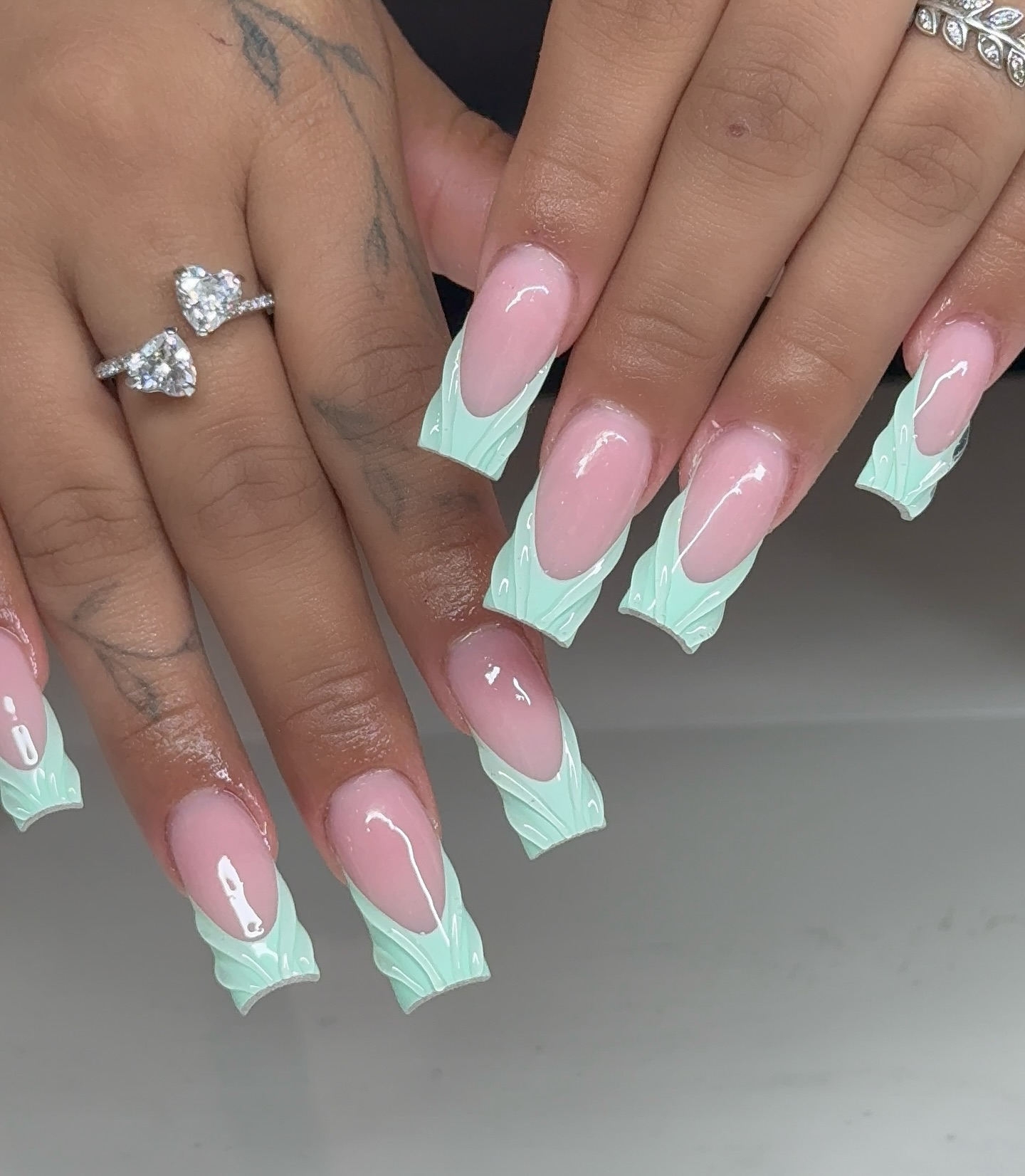 7. Minty Melting Elegance: a Modern Take on French Tips