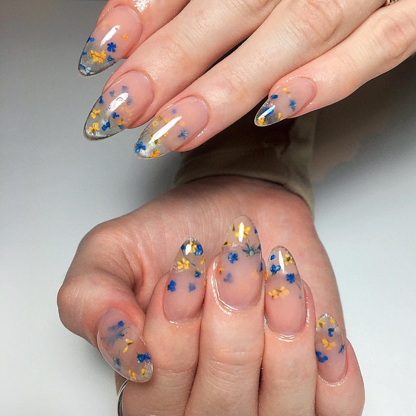 7. Nature’s Floral Canvas: Ethereal Nail Art with Dried Petals