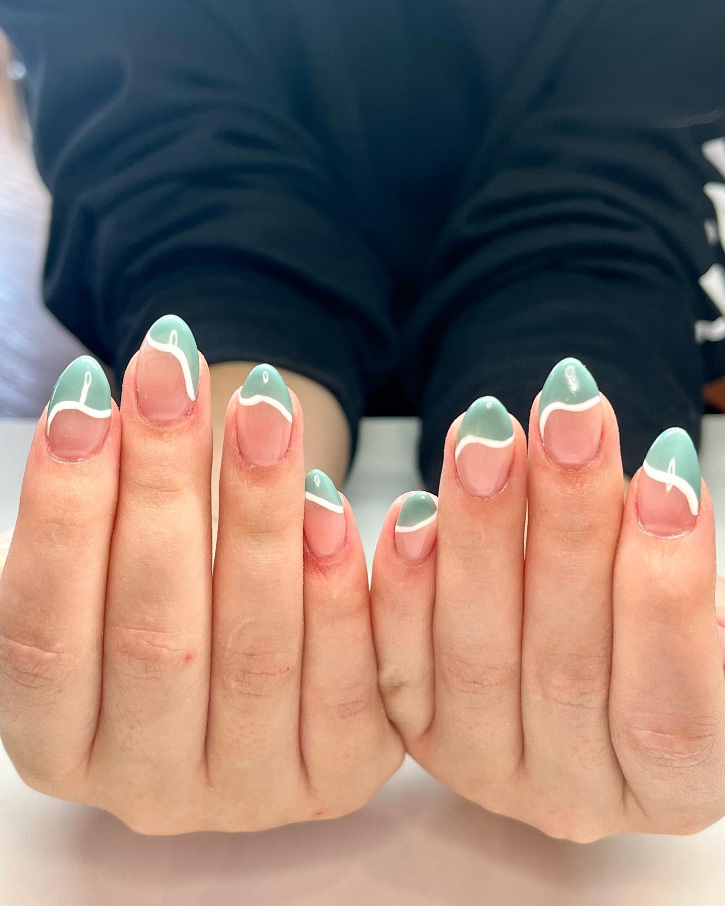 2. Nature's Elegant Waves: the Sage Green Nail Art