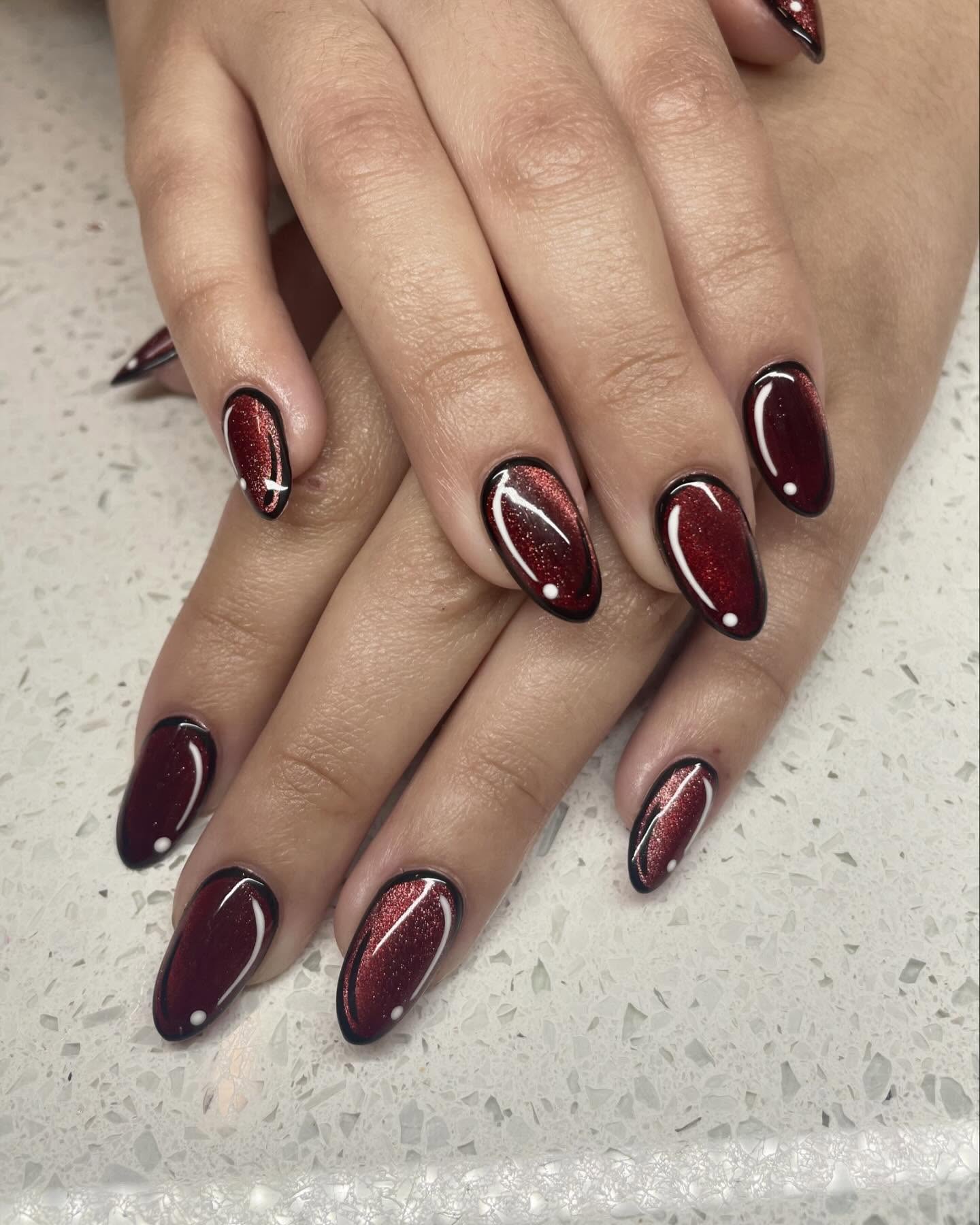 31. Glossy Garnet Radiance with a Bold Twist