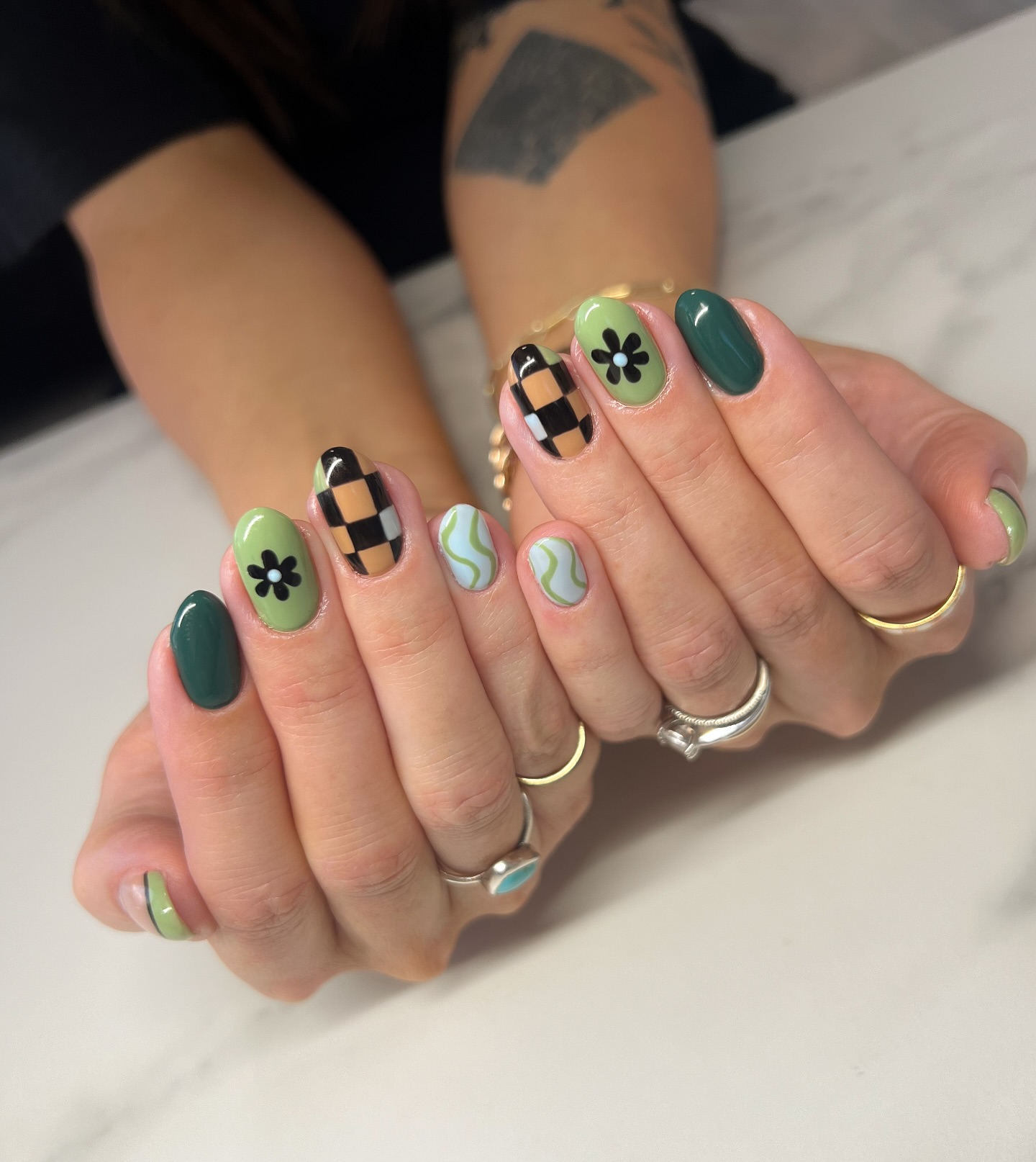 24. Whimsical Greenery Meets Retro Checkerboard Charm