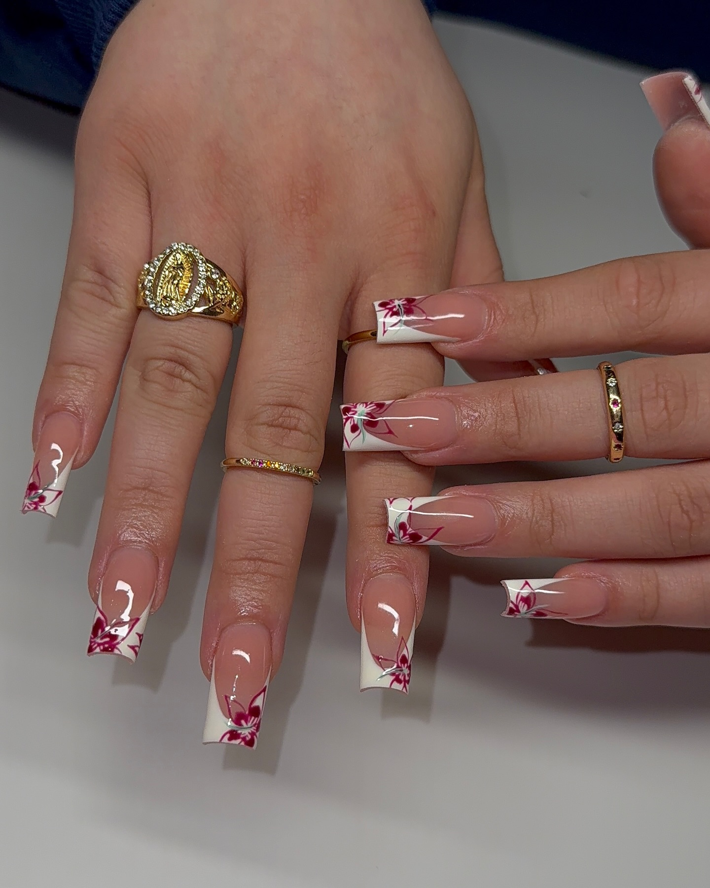 35. Whispers Of Spring: Floral Elegance Meets Classic French Tips