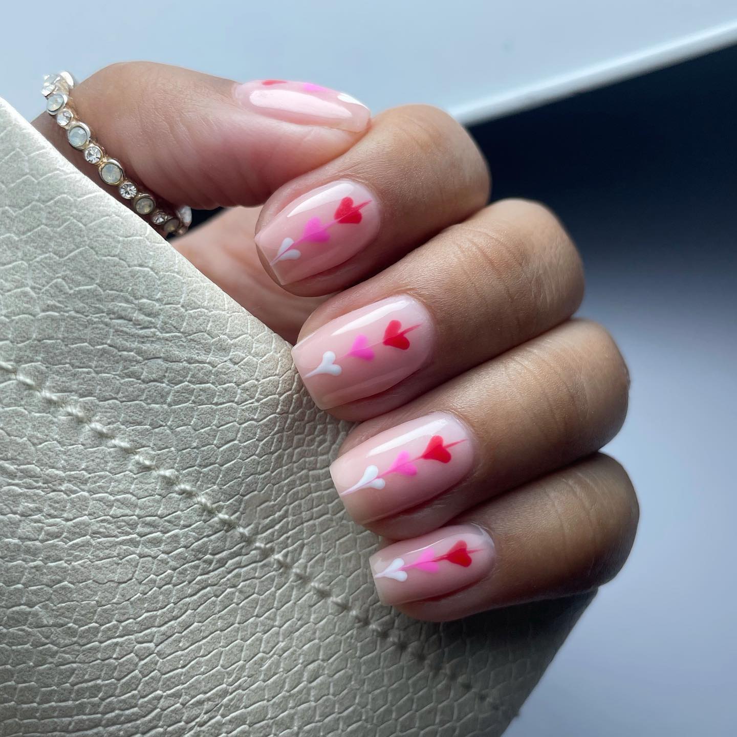 1. Hearts In a Whimsical Dance: the Playful Gradient Nail Art