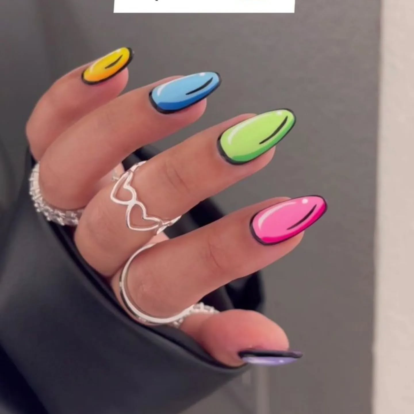 42. Pop Art Palette: Reviving Vibrant Nail Expressions with a Twist