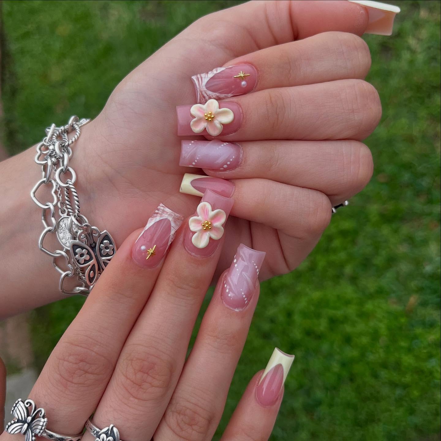 54. Whimsical Petal Kisses: the Garden Charm Of French Tips