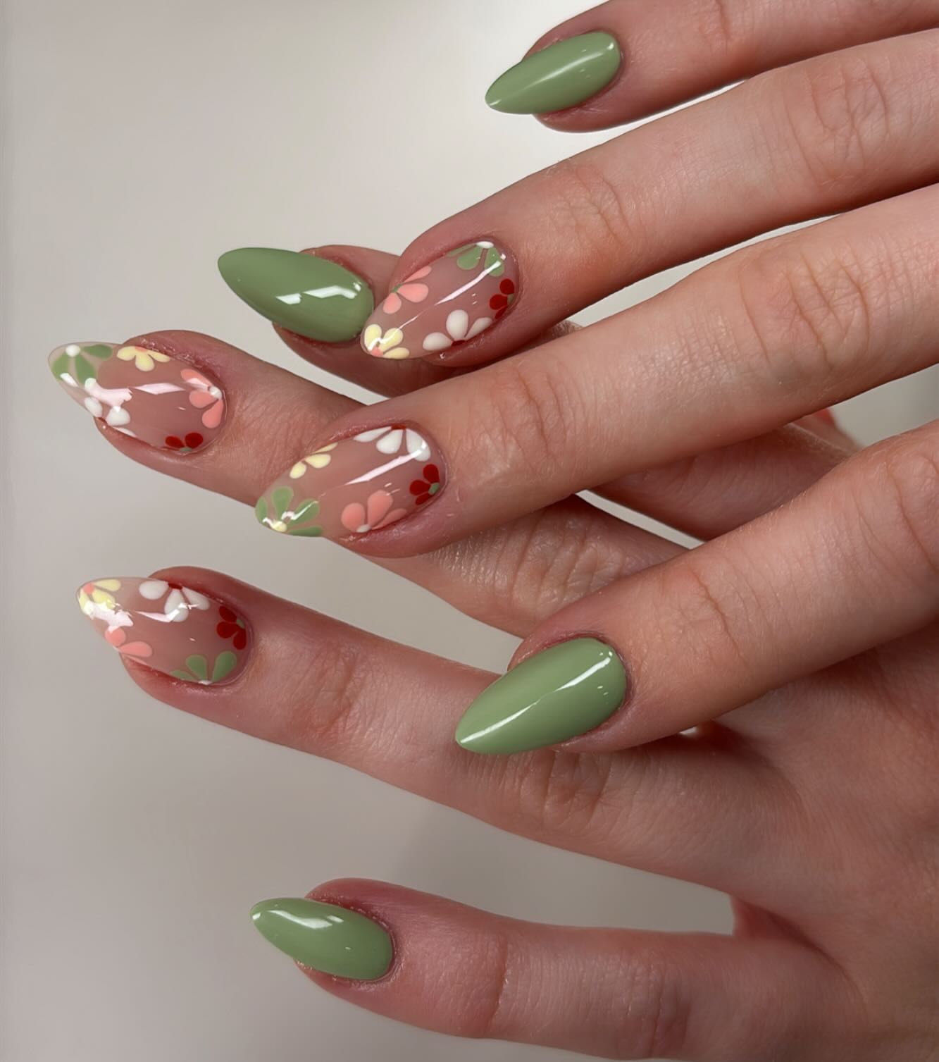 12. Whimsical Petals on a Sage Canvas