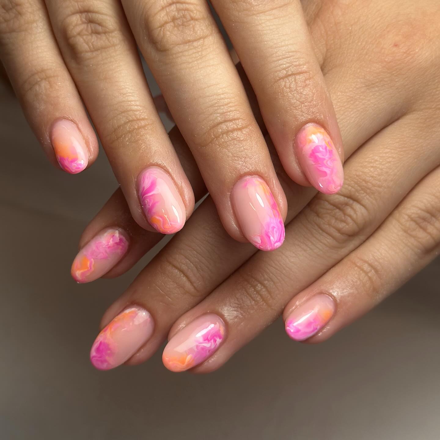 7. Tropical Sunset Swirls: a Whimsical Dance Of Peach and Fuchsia
