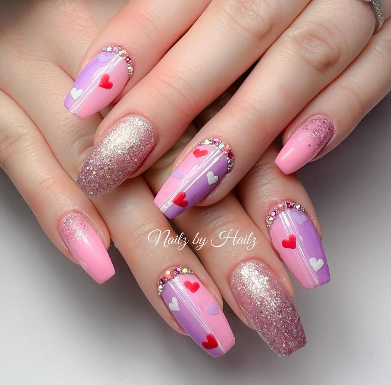 22. Cupid's Jewel Box: Dazzling Heart-embellished Nails for February Romance
