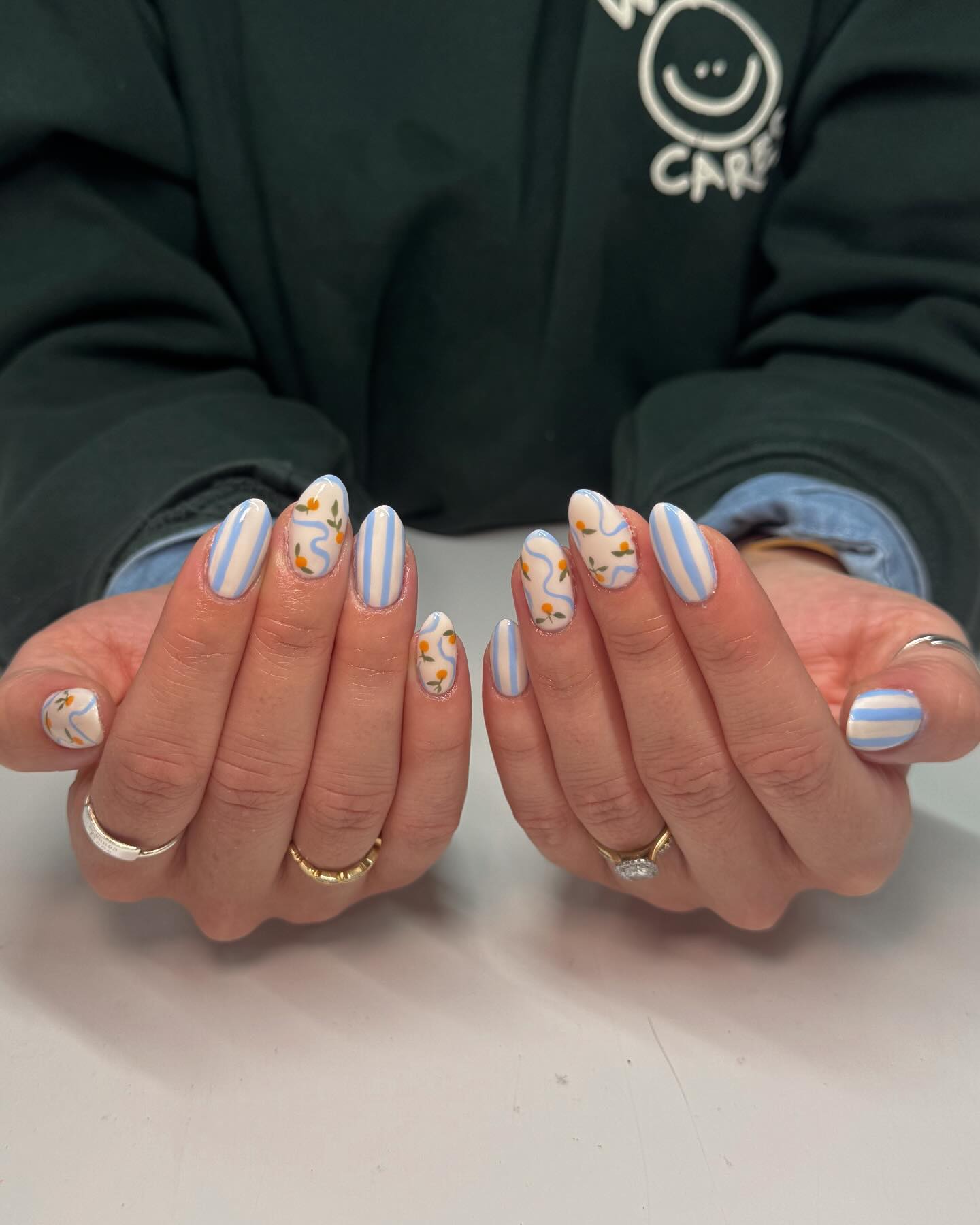 28. Whimsical Waves and Floral Flourishes: a Playful Summer Nail Adventure