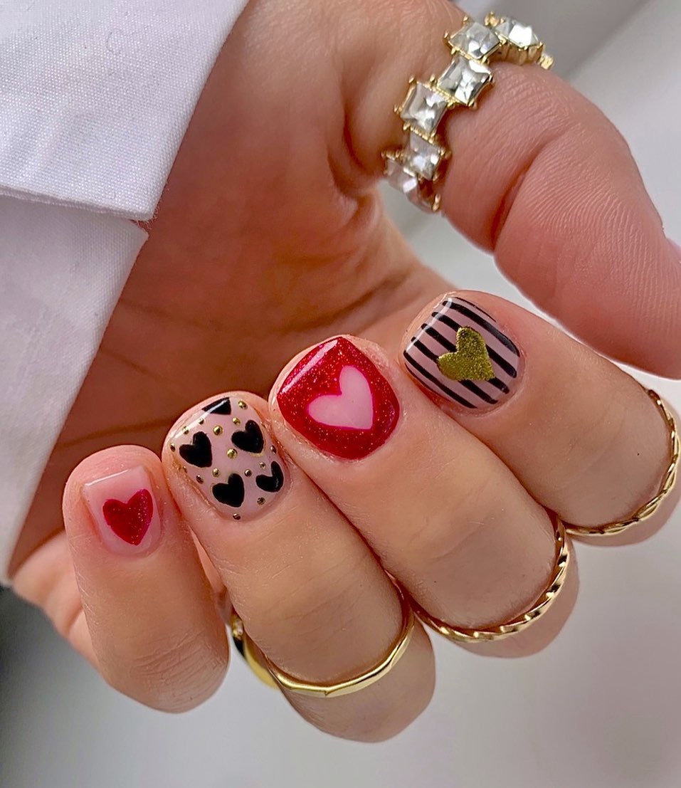 35. Valentine’s Day Vibes with a Touch Of Glam: Heartfelt Nail Art