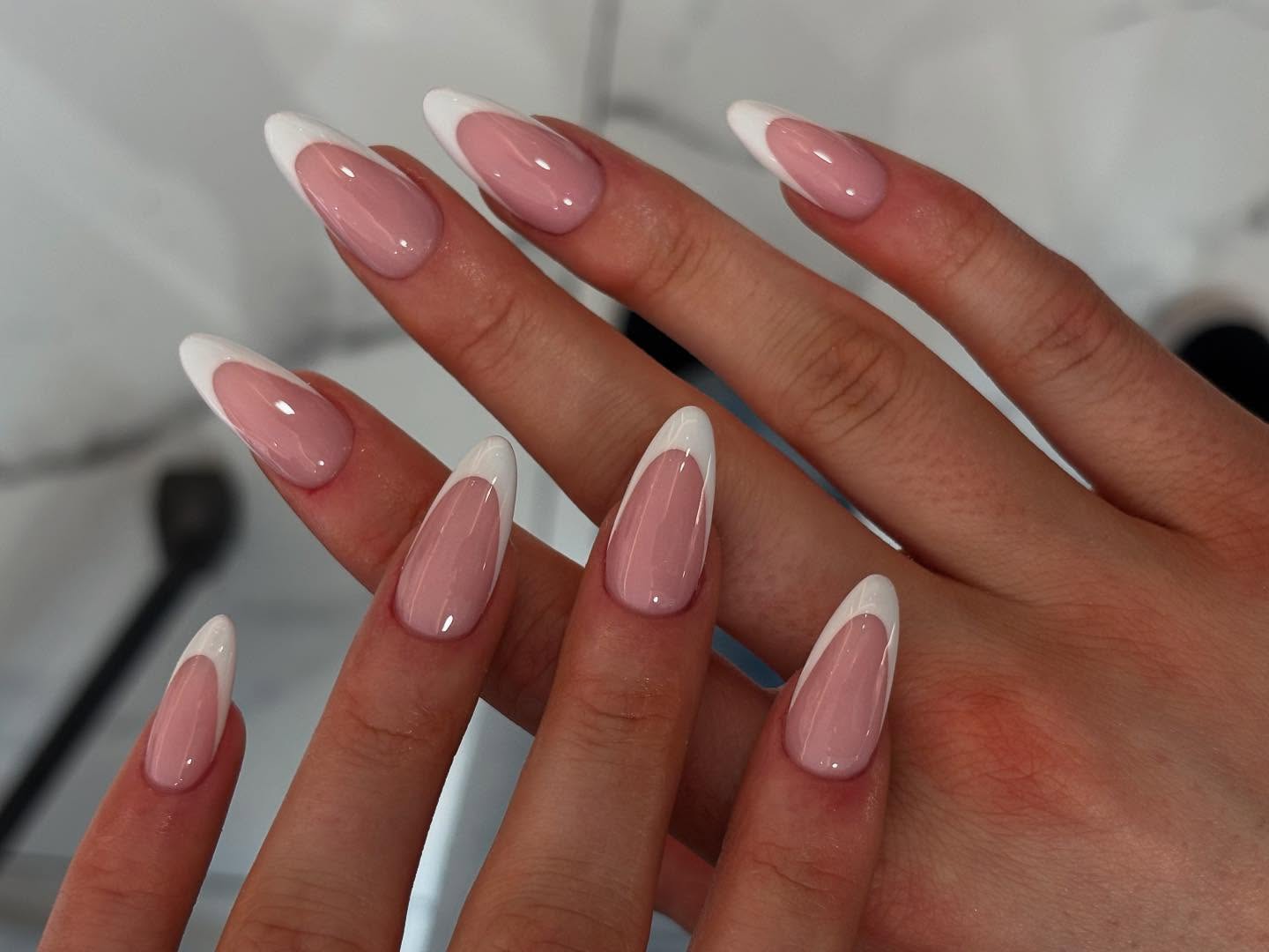 57. Chic Asymmetry: a Modern Twist on Classic French Tips