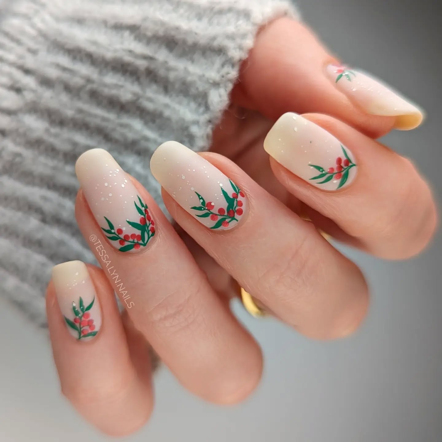 38. Winter Whimsy: Matte Ombre Nails Adorned with Festive Berries