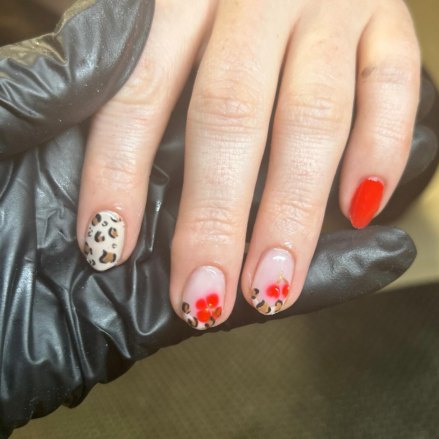 29. Fierce Safari Meets Floral Romance: the Summer Sizzle Nail Trend