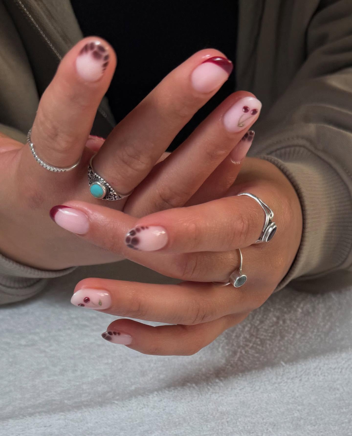 17. Whimsical Elegance: the Playful Contrast Of Crimson Tips and Earthy Dots