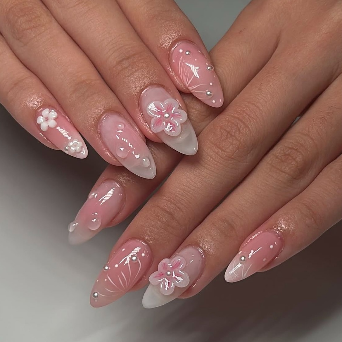 47. Blossoms In Bloom: Ethereal Petal-infused Nails for a Radiant Spring